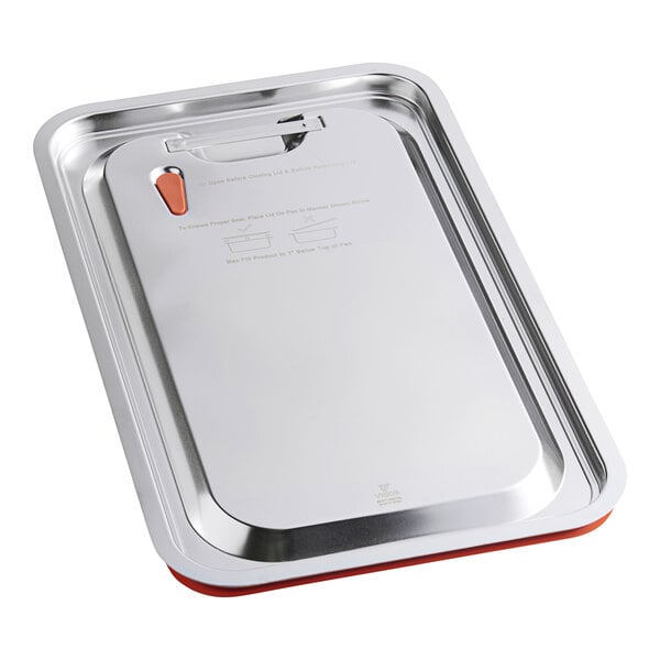 A silver stainless steel tray with a red silicone handle.