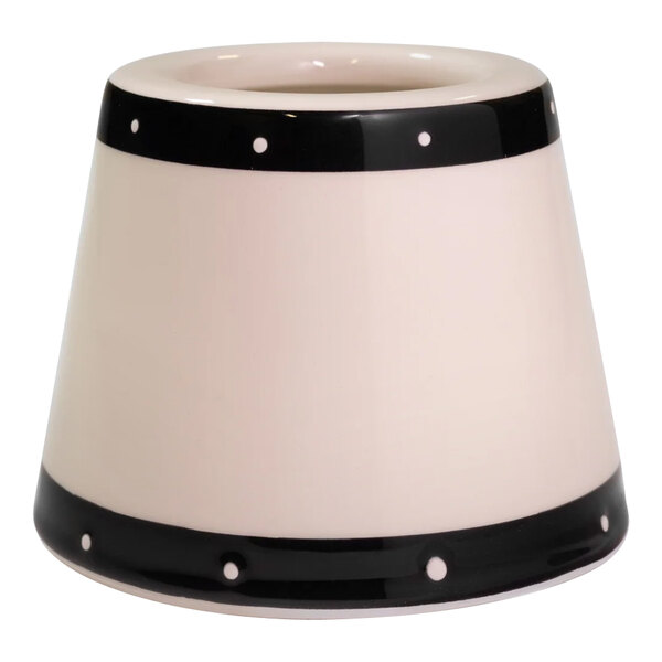 A black lampshade with white dots on a Zafferano America Poldina Pro lamp.