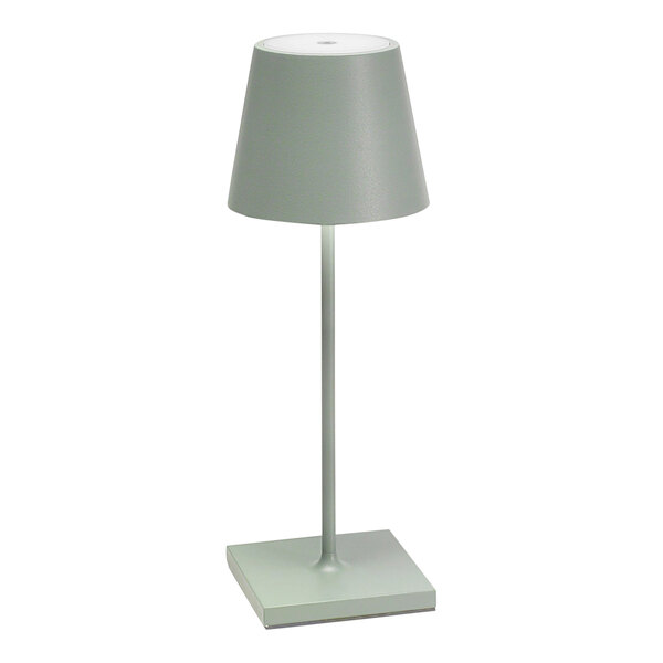 A Zafferano America Poldina Pro Mini sage table lamp on a white table stand.