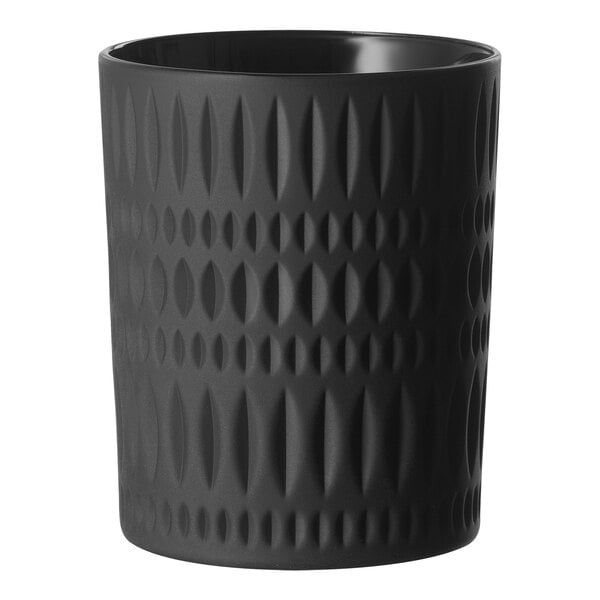 A close up of a black Nachtmann Ethno Rocks glass with a pattern.