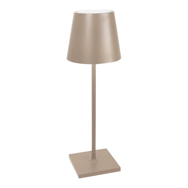 A Zafferano America Poldina Pro desk lamp with a sand-colored shade on a white pole.