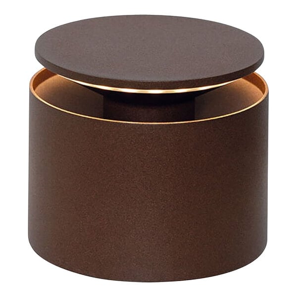 A round brown cylinder with a light inside.