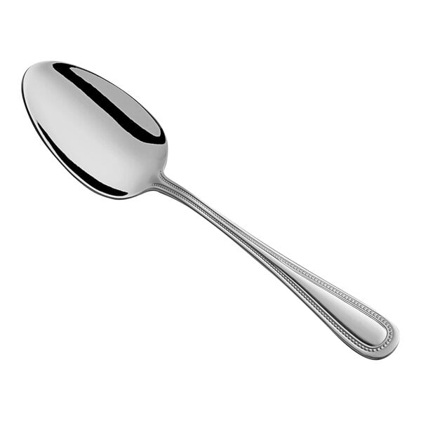 A Choice Milton stainless steel serving spoon with a silver handle and spoon.