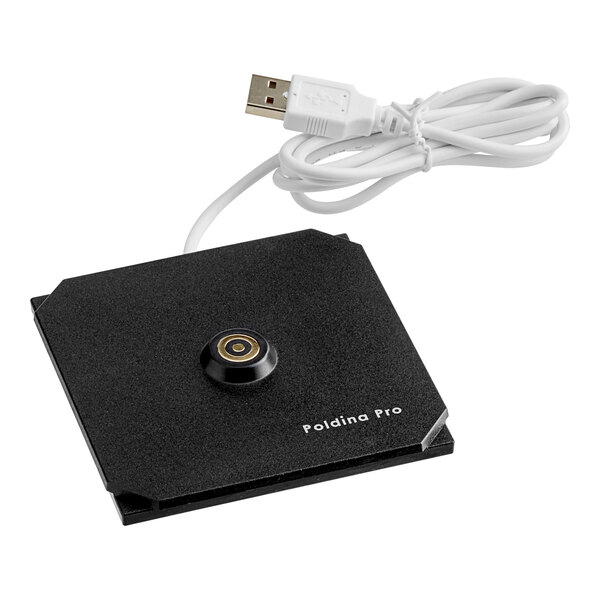 A black Zafferano America Poldina Pro table lamp charger with a white cable.