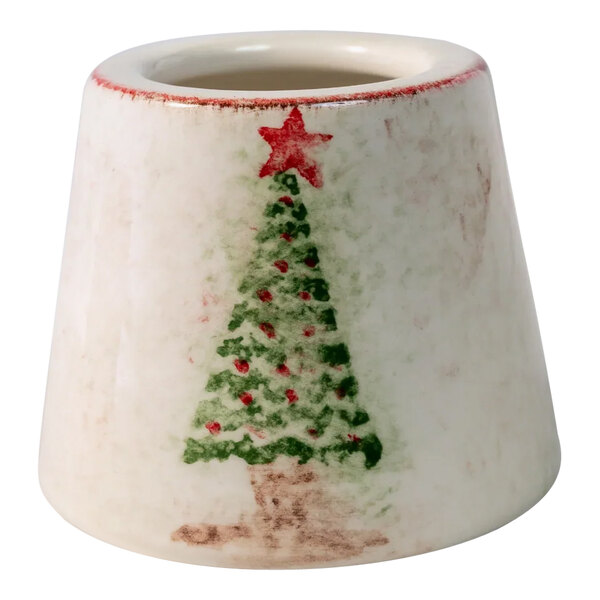 A white and red decorated lampshade with a green and red Christmas tree on it.