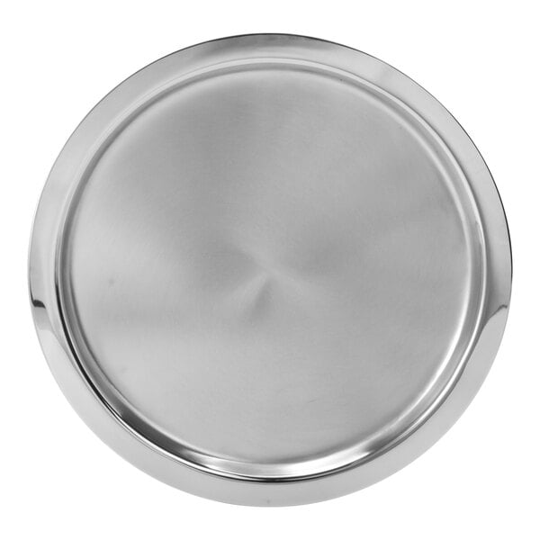 A stainless steel round tray with a raised rim.