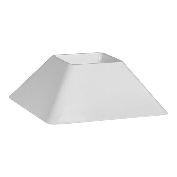 A white melamine pedestal for a square tray.