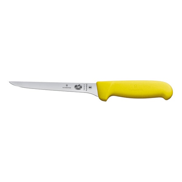 A Victorinox boning knife with a yellow handle.