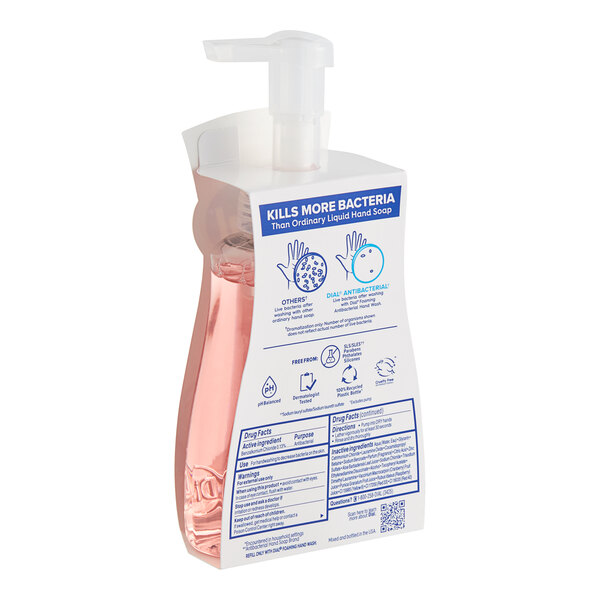 A plastic bottle of Dial Power Berries Foaming Hand Soap with a pump.