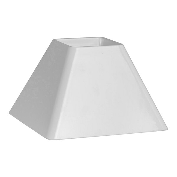 A white pedestal stand with a white background.