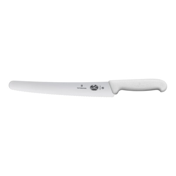 A Victorinox bread knife with a white handle.