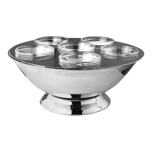 A silver bowl with six stainless steel cups on top.