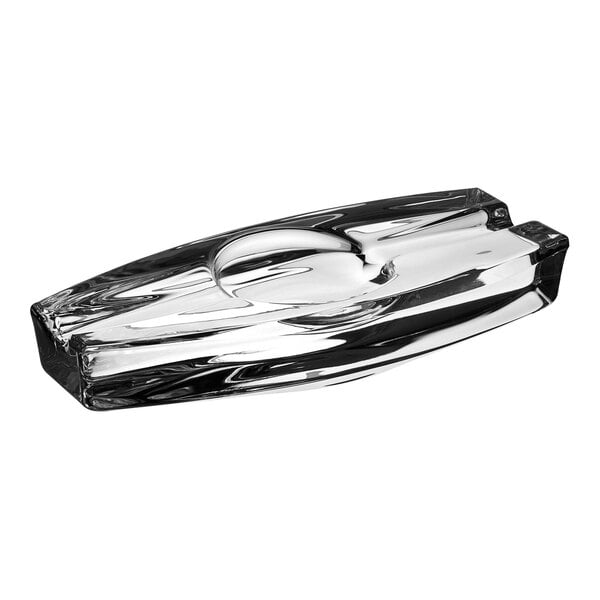 A close-up of a Nude Torcedor crystal glass ashtray.