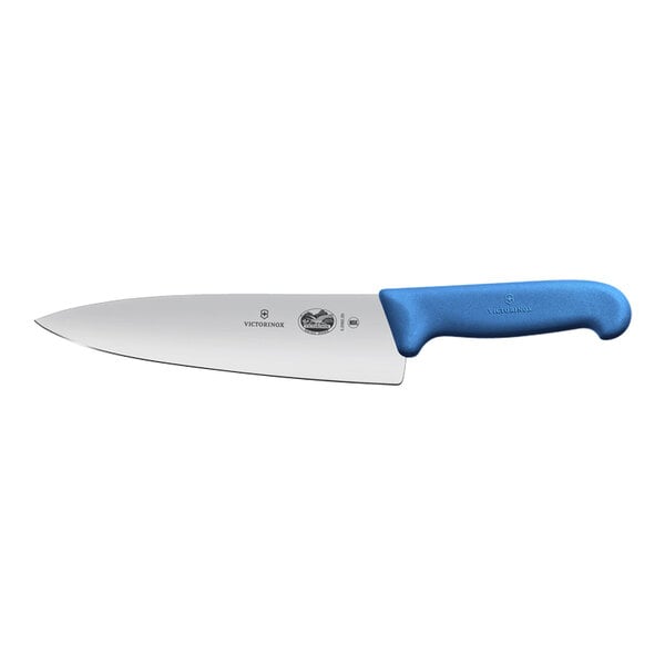 A Victorinox chef knife with a blue handle.