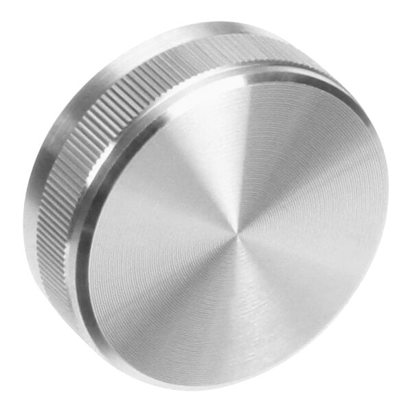 A silver stainless steel Vollrath Mirage Pro knob with a circular pattern.