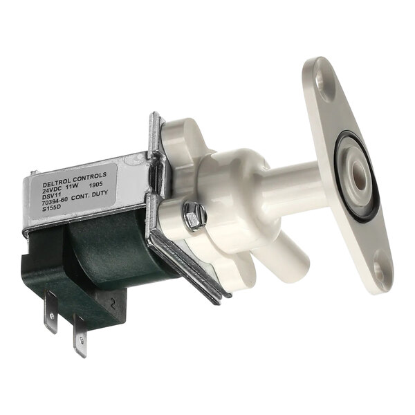 A white and black Fetco bypass valve assembly.