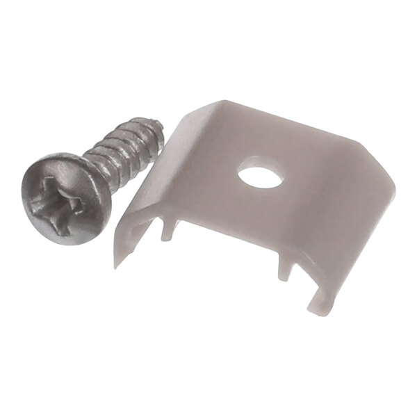 A close-up of a white plastic piece with a screw.