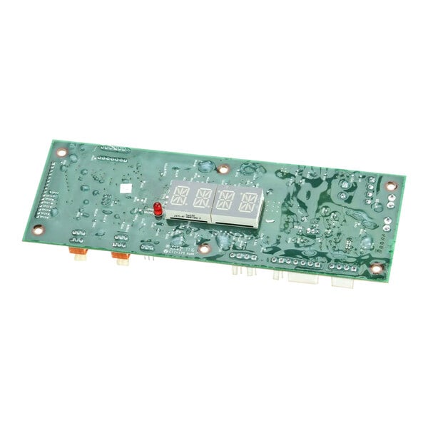 A green Lincoln Control Board with a small chip on it.