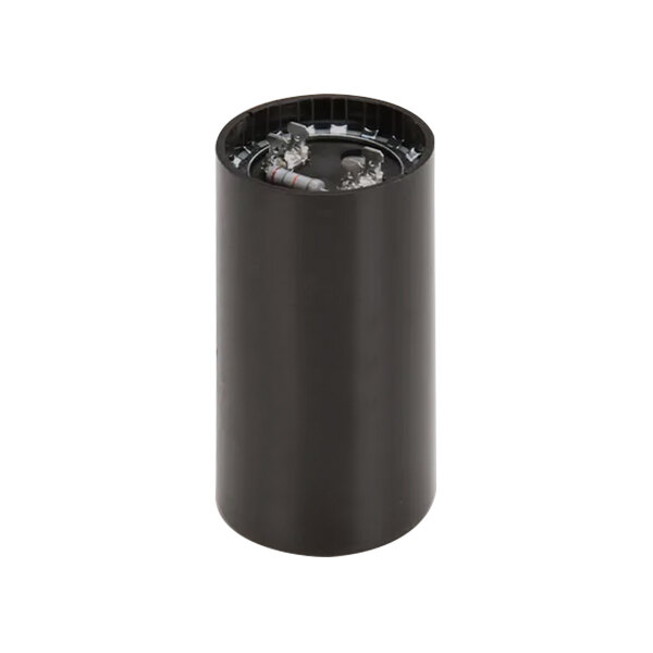 An Ice-O-Matic capacitor in a black cylindrical container with a round top.