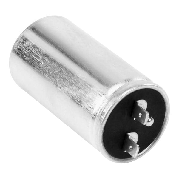 A round silver Turbo Air Refrigeration capacitor with black cover.