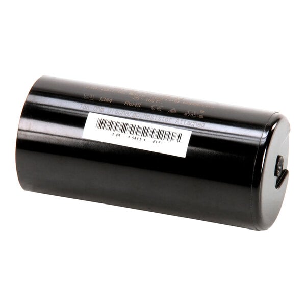 A black cylindrical Scotsman start capacitor with a white label.