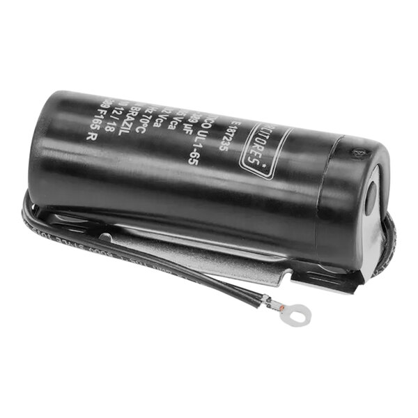 A black cylindrical True Refrigeration start capacitor with a wire attached.