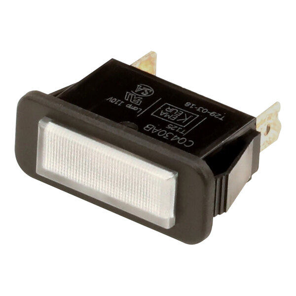 A close-up of a Fetco clear brew indicator lamp lit up white.