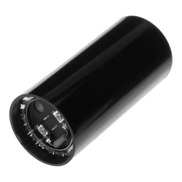 A black cylindrical object with a round capacitor inside on a white background.