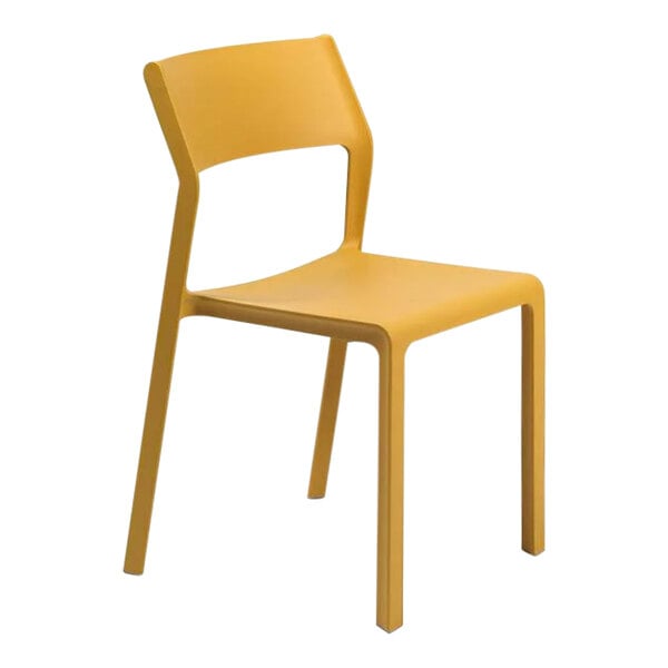 A Nardi Trill Senape resin outdoor dining chair in yellow.