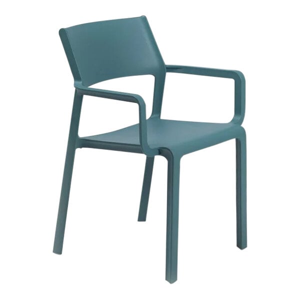 A teal plastic Nardi arm chair.