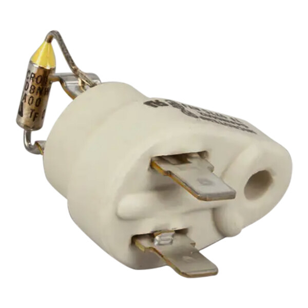 A white electrical device with two wires attached to it.