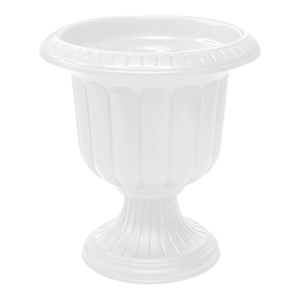 A white urn planter with a round pedestal.