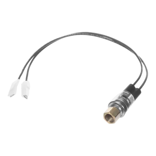 A cable with a white connector and a black wire attached to a gold and black Lennox electrical device.