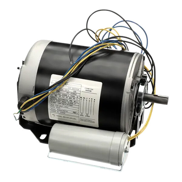 A black and silver Spaceman Genteq electric motor with yellow and blue wires.