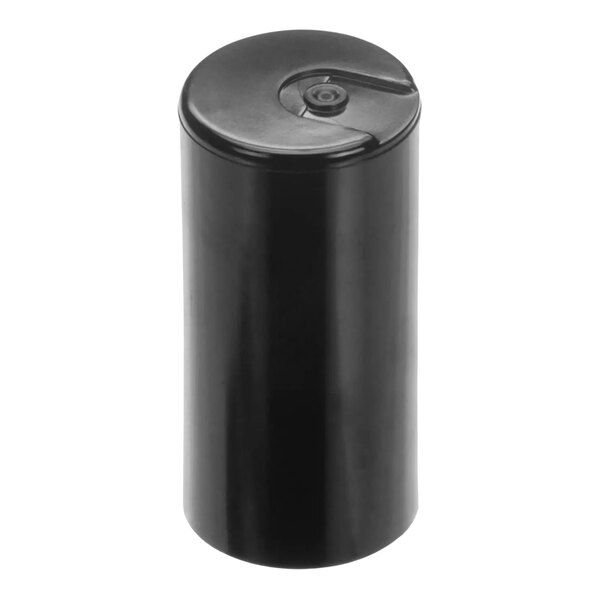 An Ice-O-Matic capacitor in a black container with a black lid.