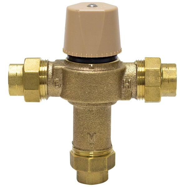 A brass Advance Tabco thermostatic mixing valve with a gold colored cap.