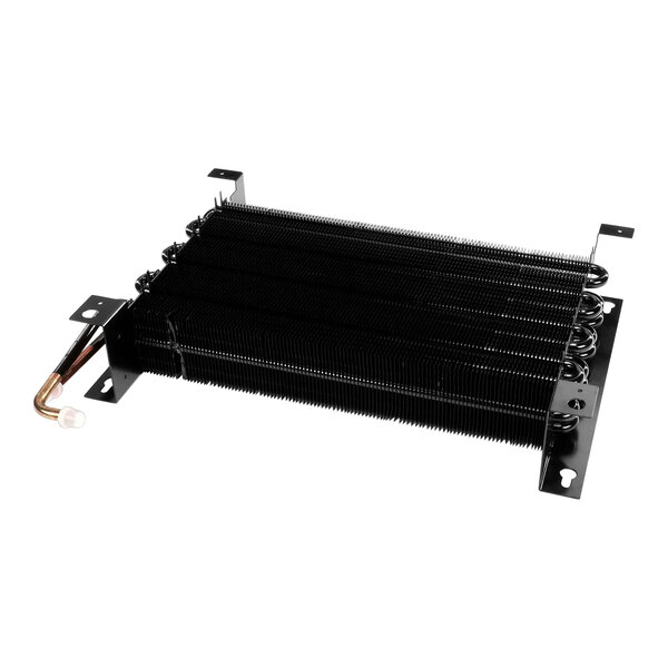 A black metal evaporator coil for a Follett ice machine.