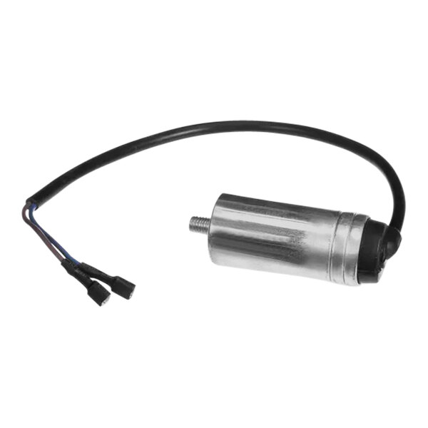 A True Refrigeration run capacitor, a small metal cylinder with wires.