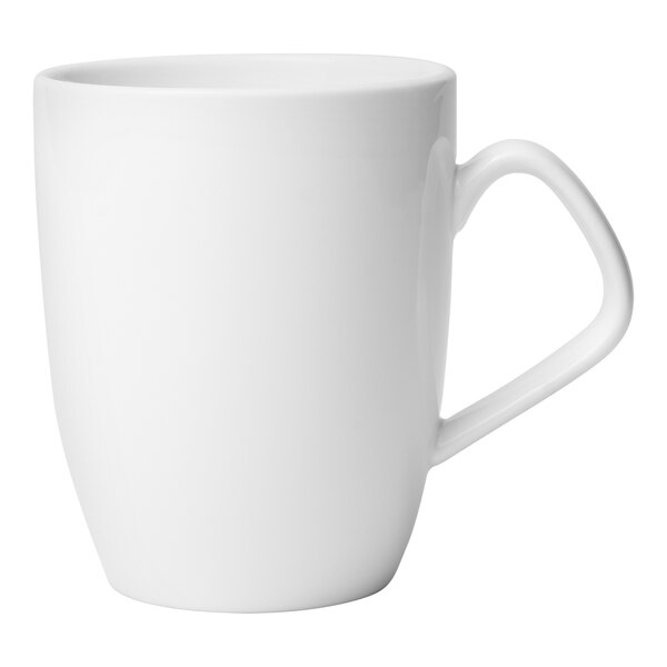 A close-up of the handle of a Libbey white porcelain mug.