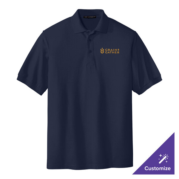 A navy Port Authority polo shirt with a gold logo on it.