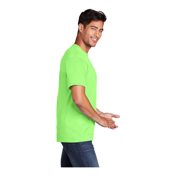 A man wearing a neon green Port & Company T-shirt.