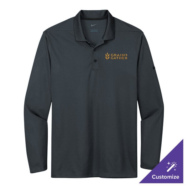 A black Nike long sleeve polo shirt with gold embroidery.