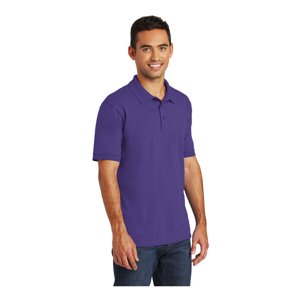 A man wearing a purple Port & Company jersey knit polo shirt.