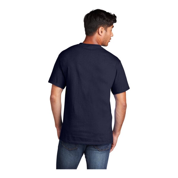 A man wearing a Port & Company True Navy short sleeve T-shirt.