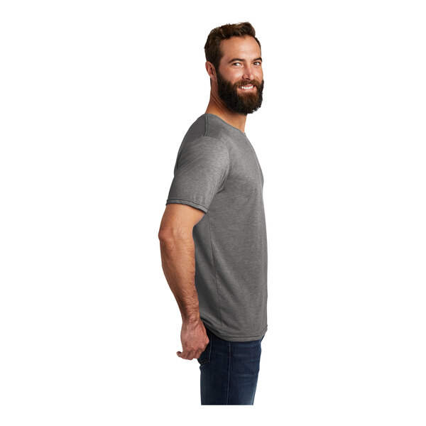 A man with a beard wearing a customizable grey AllMade t-shirt.