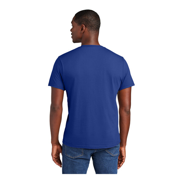 A man wearing a District Deep Royal blue short sleeve t-shirt.