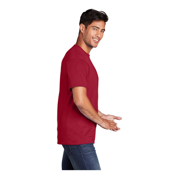 A man wearing a red Port & Company t-shirt.
