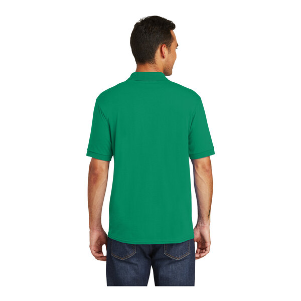 A man wearing a green Port & Company polo shirt.