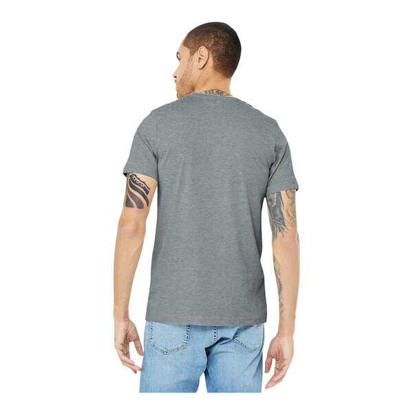 A man wearing a Bella + Canvas athletic heather grey short sleeve t-shirt.