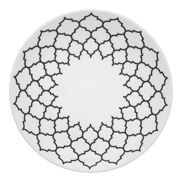 A white Libbey porcelain plate with a black geometric design.